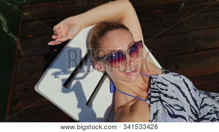 Woman Shooting Self Portrait. Take Photo And Video On Smartphone. Girl Rest, Relax, Walk In Sunglass
