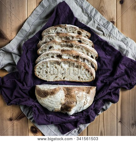 White Flour Warm Spot Levain Bread On A Rustic Table