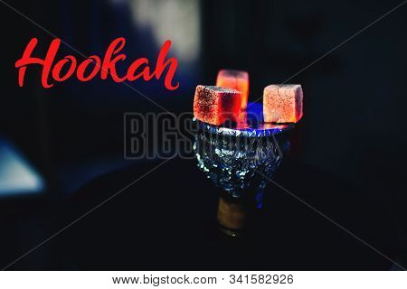 Hot Red Coals On Foil On A Hookah Bowl Close Up