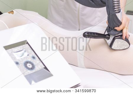 Lpg Girl Body Massage In Spa. The Girl Is Given A Hardware Massage, She Is Wearing A Special Jumpsui