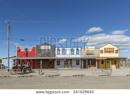 Seligman, Usa - March 7, 2019: Old Historic Wild West Facade With Livery And Tonsorial Of Doc Hollid