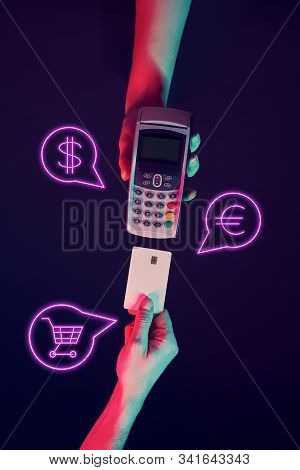 Concept Of Online Or Wireless Payments. Hands With Pinpad And Credit Card With Payment Icons. Modern