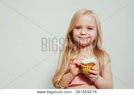 Beautiful Little Girl Blonde With Cake And Candy Portrait Of Food