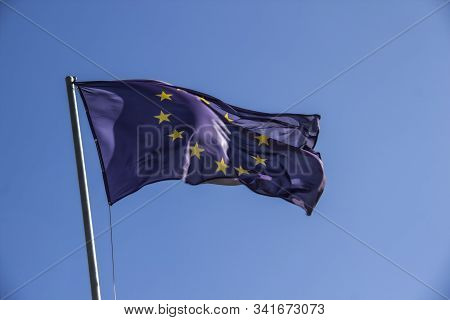 A European Flag In The Blue Sky
