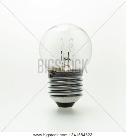 The Old Light Bulb On The White Background