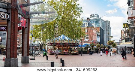 A Vintage Merry-go-round Game In A Paved Square. Eindhoven, Netherlands.