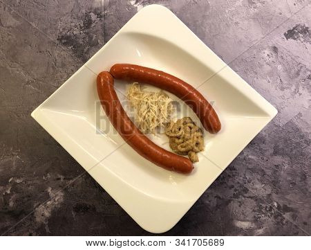 Debreziner Sausages With Mustard And Fresh Horseradish.