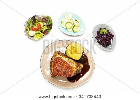 Grilled Frankonian Schaeufele With Dumpling On White