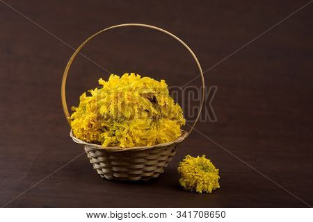 Marigold (zendu Flowers) Flowers In A Bamboo Basket.