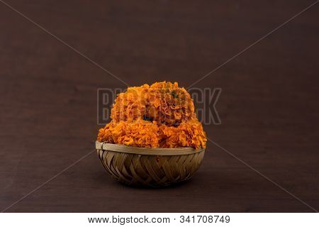 Marigold (zendu Flowers) Flowers In A Bamboo Basket.