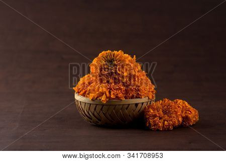 Marigold (zendu Flowers) Flowers In A Bamboo Basket.