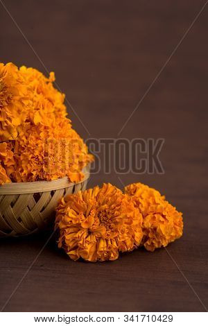 Marigold (zendu Flowers) Flowers In A Bamboo Basket.