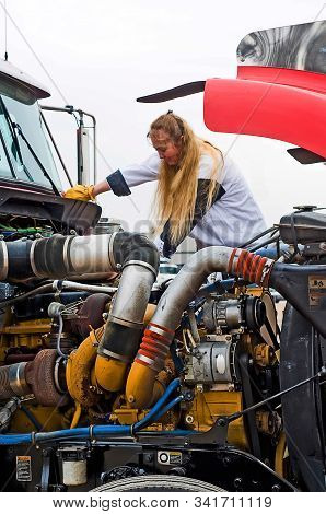 Checking Fluid Levels On A Big Rig