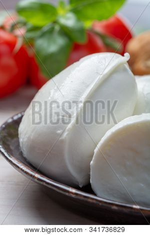 Balls And Pieces Of Buffalo Mozzarella, Soft Italian Scheese Made From The Milk Of Italian Mediterra