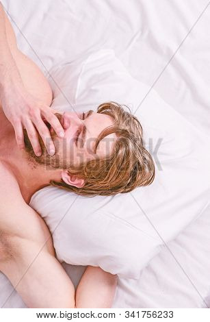 How Much Sleep You Actually Need. Bearded Man Sleeping Face Relaxing On Pillow. Man Handsome Guy Lay