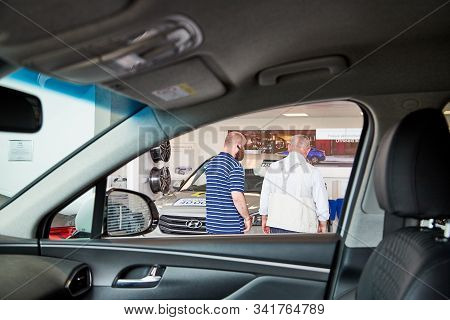 Petrozavodsk, Russia - June 21, 2019: Managers In Showroom With Cars Of Dealership Hyundai In Petroz