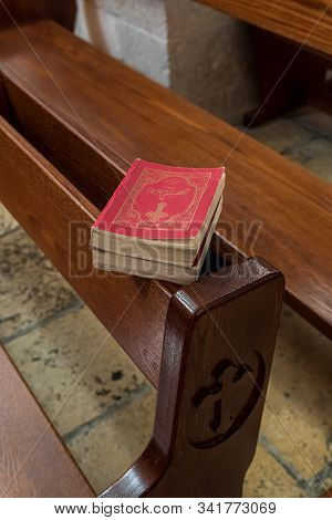 Jerusalem, Israel, December 28, 2018 : Holy Books In Arabic Lay On A Bench For Prayer In The Hall Of