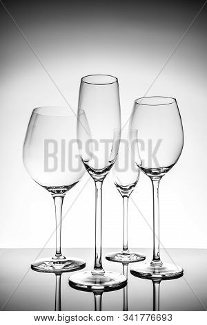 Glassware Selection With Wine, Champagne And Liquour Glasses On The Light Background.. Fine Cristal 