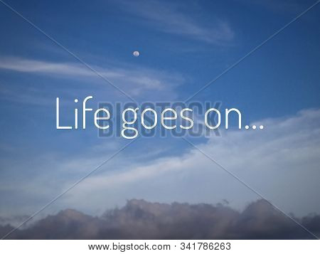 Inspirational Motivational Quote - Life Goes On. With Simple Text Messages Design Written On Bright 