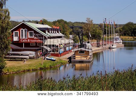 Norsholm, Sweden - July 5, 2018: View Of The Kapten Billes Uouth Hostel And Cafe At The Gota Canal.