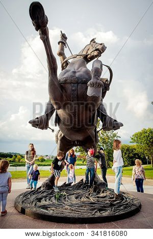 Kaunas, Lithuania - July 14, 2018: Tourists Admire Newly Erected Sculpture Freedom Warrior In Kaunas