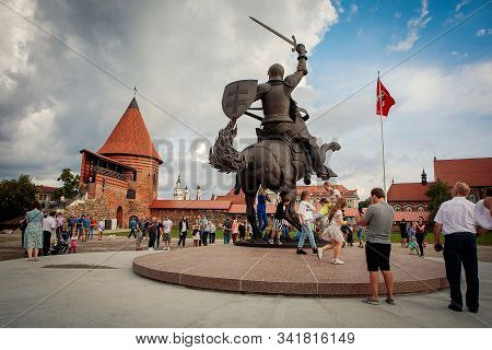 Kaunas, Lithuania - July 14, 2018: Tourists Admire Newly Erected Sculpture Freedom Warrior In Kaunas