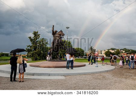 Kaunas, Lithuania - July 14, 2018: Tourists Admire Newly Erected Sculpture Freedom Warrior In Kaunas
