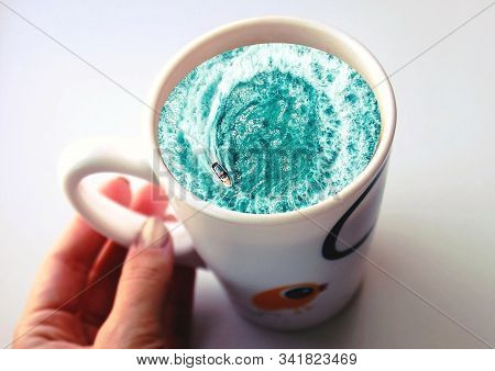 White Cup With Water. Sea. Ocean. Sea Waves. Creative Postcard.