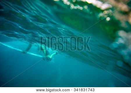 Surfer Passes The Wave By Diving, Fuerteventura Island