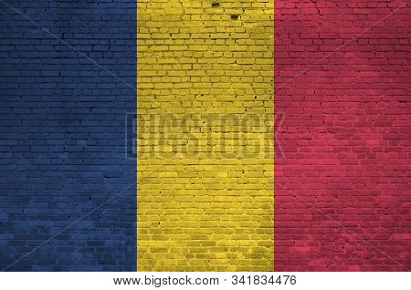 Chad Flag Depicted In Paint Colors On Old Brick Wall. Textured Banner On Big Brick Wall Masonry Back
