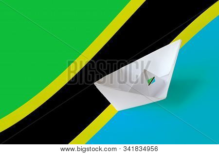 Tanzania Flag Depicted On Paper Origami Ship Closeup. Handmade Arts Concept