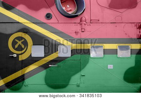 Vanuatu Flag Depicted On Side Part Of Military Armored Helicopter Closeup. Army Forces Aircraft Conc