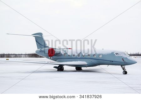 Novyy Urengoy, Russia - March 1, 2014: Business Jet Gulfstream Aerospace G650 Covered With Snow In T