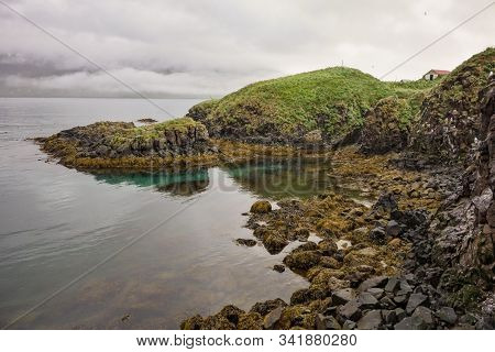 The Landscape Of Puffin Marina And Borgarfjardarhofn With Rocks And Water Bay In Iceland, Europe