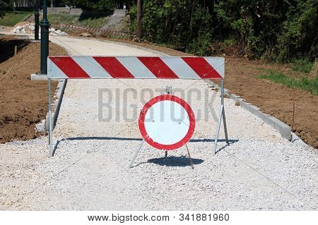 Road Closed Access Denied For All Vehicles Red And White Empty Road Sign Next To Stripped Warning Si