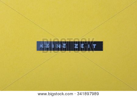 Keine Zeit German Language Means No Time To Loose - Printed With A Labelprinter On Yellow Background