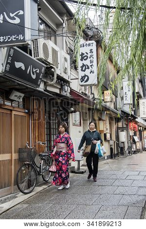Osaka, Japan- 28 Nov, 2019: People Walk On Hozenji Yokocho In Osaka. Hozenji-yokocho Alley Is Stone-