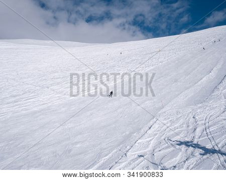 Slopes Of Parnassos Mountain With People In A Sunny Day