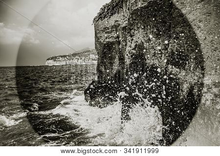 Wave Splash On Rock Cliff In Sorrento, Italy. Blackand White Seascape.