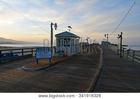 Santa Barbara, California - May 18, 2019: Stearns Wharf At Sunrise Under Colorful High Altitude Clou