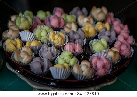 Kleeb Lamduan : Thai Shortbread Cookies, Traditional Thai Desserts Serving On A Wooden Background.
