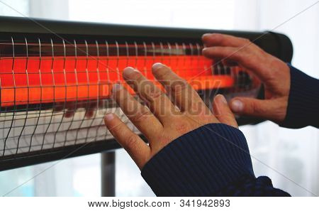 Infrared Heater In The House. Warm Light. Incandescent Lamp.