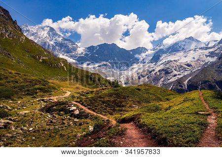Hiking Trail High Up In The Pennine Alps Near The Lake Arpitetta. Ayer, Valais, Switzerland