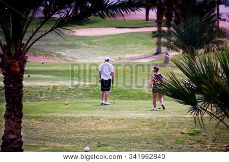 Sharm El Sheikh, Egypt - February 2018. Golfer Getting Ready To Play. The Golf Course Is Called Mari