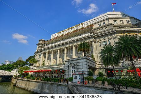 Singapore - Feb 9, 2018. Famous Fullerton Hotel With Riverscene In Singapore. Singapore Is Global Fi
