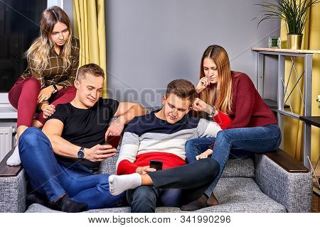 Bromance Is A Close But Nonsexual Relationship Between Two Men. Young People, Men And Women Are Sitt
