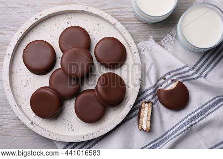 Tasty Choco Pies And Milk On White Wooden Table, Flat Lay