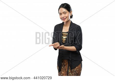 Beautiful Woman Wearing Traditional Javanese Clothes Presenting