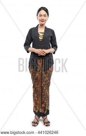 Attractive Young Woman Wearing Kebaya Standing On Isolated Background