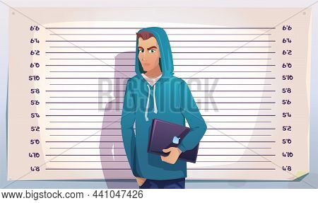 Cyber Crime, Hacker Mugshot. It Criminal Teenager With Laptop Stand On Measuring Height Scale Backgr